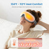 A woman is using a heated eye massager, which emits warm light, to relieve eye fatigue.