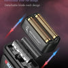 Close-up view of a black electric hair shaver with removable and detachable blade mesh designs.