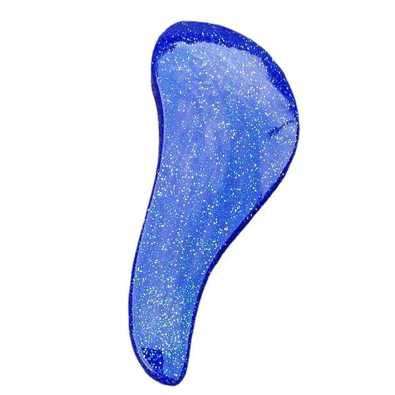 A bright blue silicone detangling hair brush with a translucent, glittery finish.