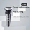 A silver electric shaver with a textured head is shown against a light gray background, highlighting its classic reciprocatin