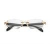 A pair of retro frameless reading glasses with thin gold-toned metal frames and clear lenses.