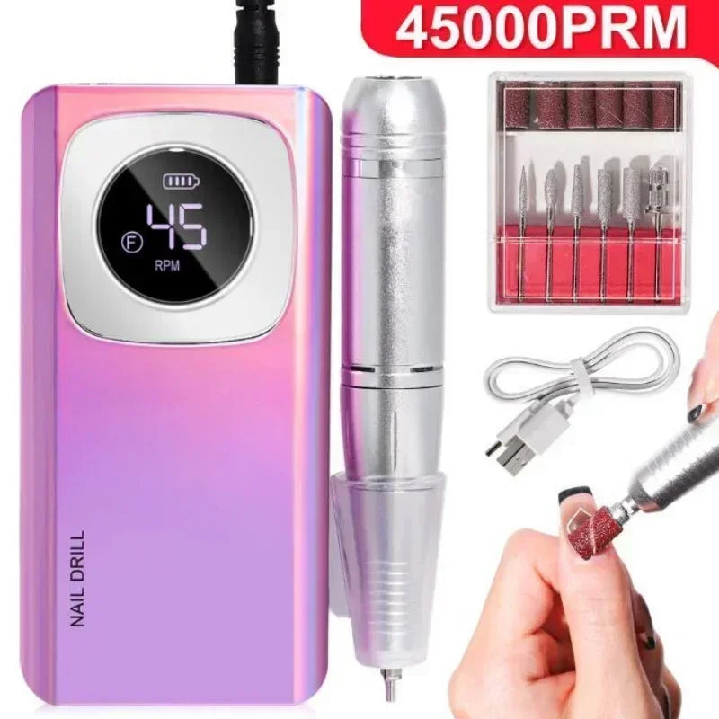 Perceuse électrique rechargeable pour ongles rose avec embout amovible et câble de charge.