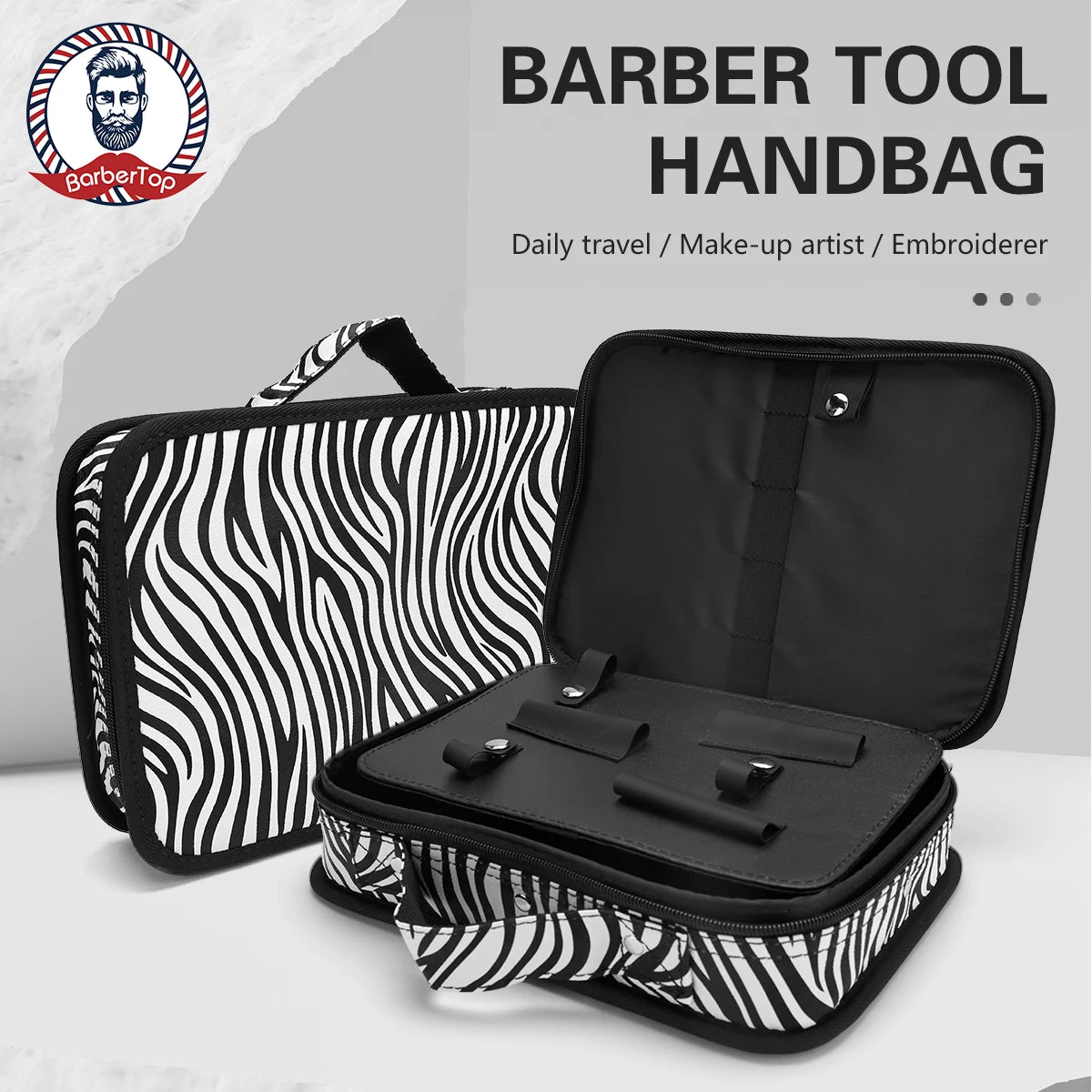 A black and white zebra-print barber tool handbag with an open flap showing storage compartments.