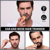A man is using a portable electric nose hair trimmer for facial hair grooming.