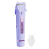 A purple electric shaver with a dual head next to a detached shaving head.
