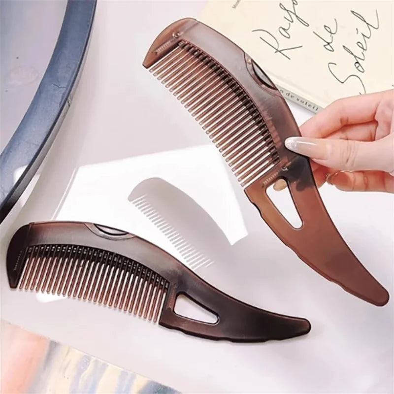 A brown self-cleaning dandruff relief comb with scalp massage is shown next to a piece of paper.