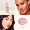 A close-up of a liquid light liquid luminizer product and models showcasing its glow on their skin.
