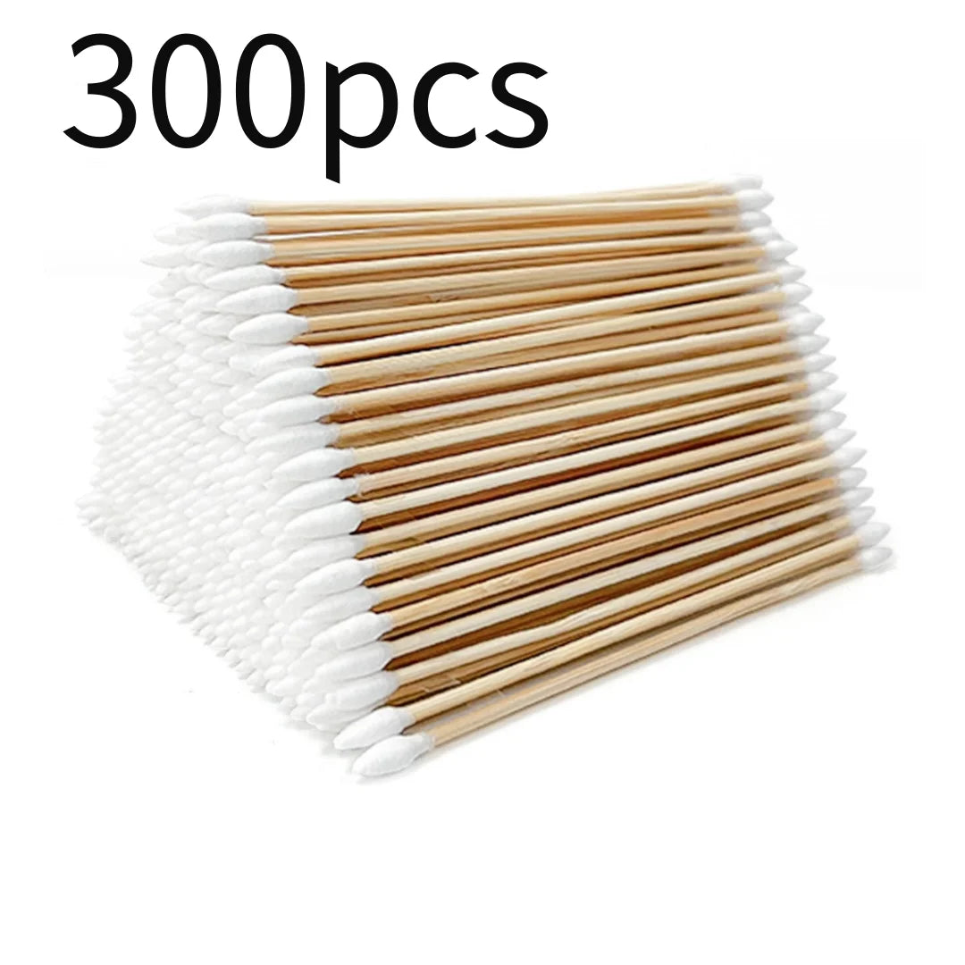 A collection of 300 precision wooden cotton swabs, divided into white and brown groups.