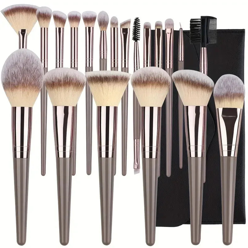 A complete makeup brush set featuring various facial and eye brushes in shades of brown and gray.