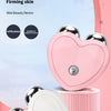 Pink and white microcurrent facial massager devices shown in various forms, including a heart-shaped device and a cylindrical