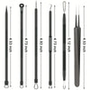 Ein Set aus Edelstahl-Blackhead-Extraktoren in verschiedenen Größen und Maßen.
