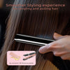 A hand uses a black ceramic 3D floating plate hair straightener on dark brown hair for smoothing.