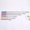 A collection of colorful telescoping stainless steel back massagers with various colored handles and metal tips.