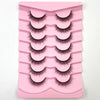 Plateau en plastique rose contenant un ensemble de faux cils en fourrure de mink 3D dramatiques.