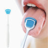 A close-up of a blue reusable stainless steel tongue scraper being used on a person's tongue for oral hygiene.
