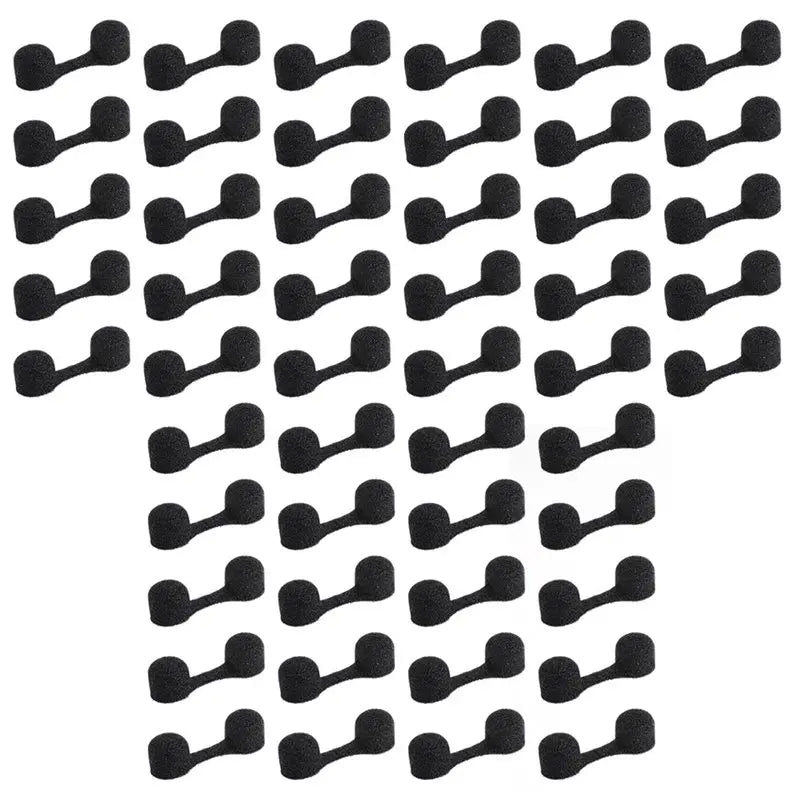 A collection of black disposable sponge nostril dust filters arranged in a grid pattern.