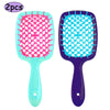 A pair of professional detangling hair brushes, one pink and one blue, shown against a white background.
