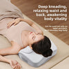 A woman is lying on a massage pillow for deep kneading and relaxing waist and back massage.