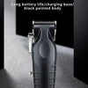 A black rechargeable hair clipper grooming kit with a long battery life and charging base shown against a dark background.