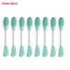 A set of eight green silicone facial brushes for exfoliation