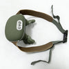 A green electric neck and shoulder massager with a brown strap is shown against a white background.