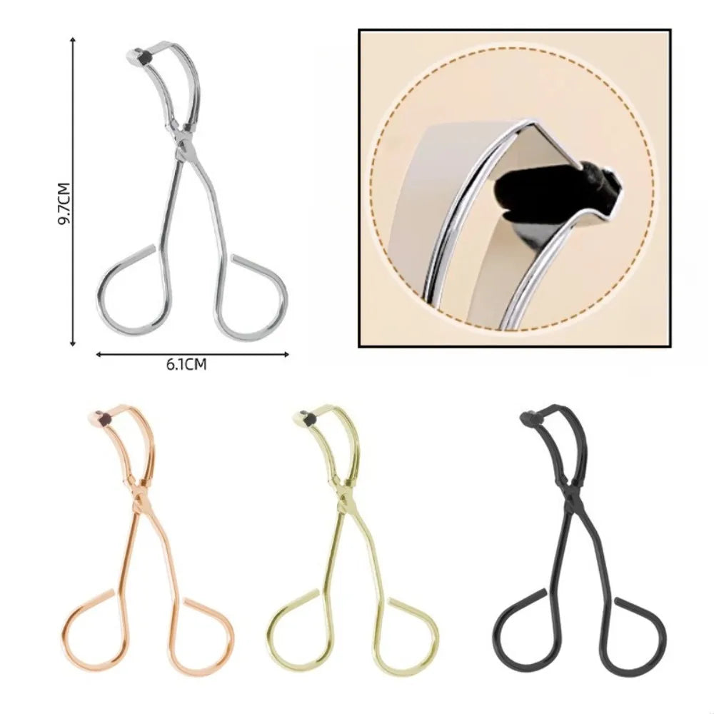 A set of mini stainless steel eyelash curlers in gold and black colors.