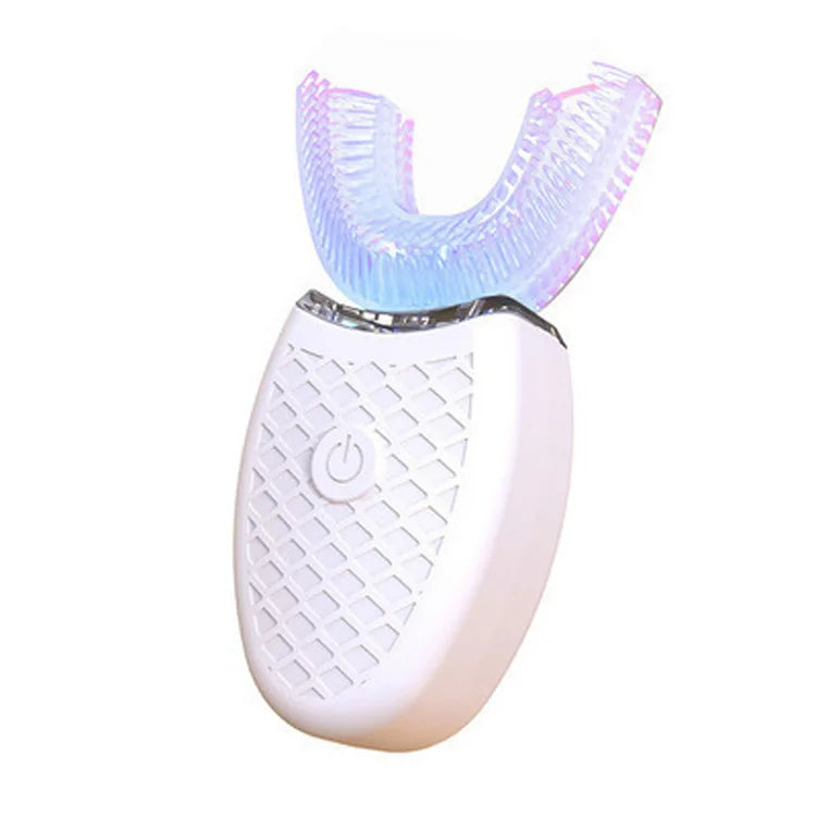 A white electric toothbrush with a translucent purple silicone brush head is shown.