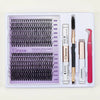 Kit blanc contenant des cils individuels, un dissolvant et de la colle pour extensions de cils DIY.