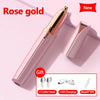 A new rose gold precision electric eyebrow trimmer with two cutter heads, USB charging cable, and a brush included.