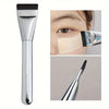 A silver oval foundation brush shown in various angles, including a close-up of the brush and its application on skin.