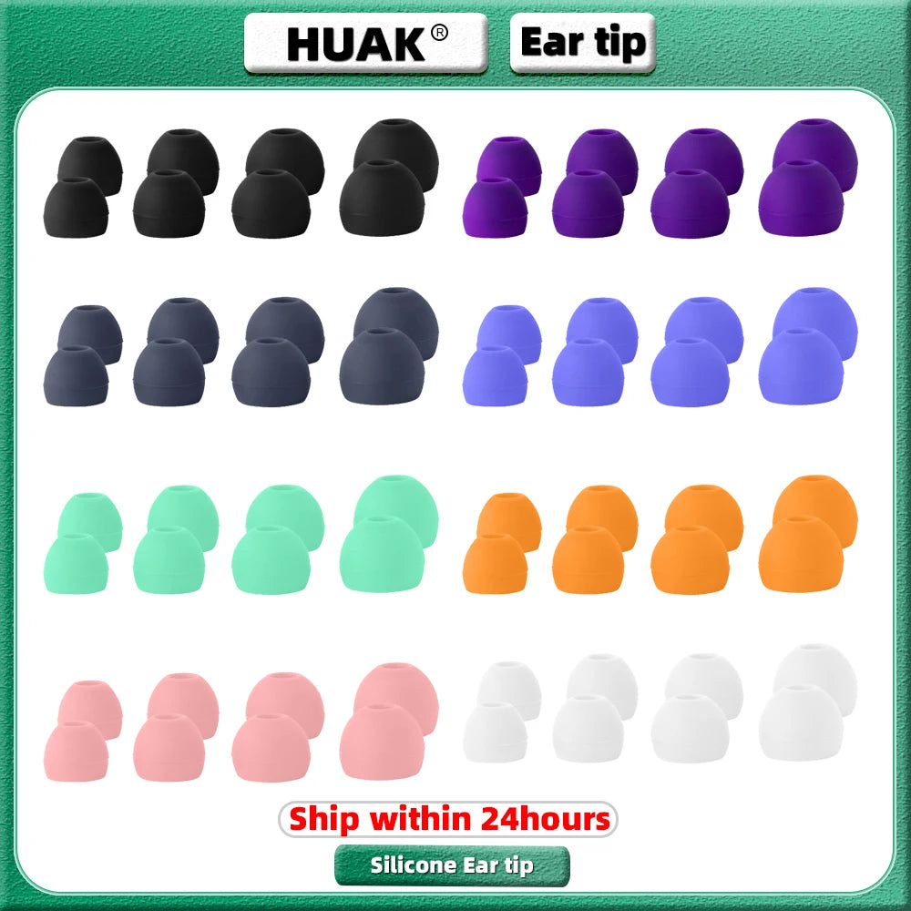 A collection of various colored silicone ear tips and plugs displayed on a green background.