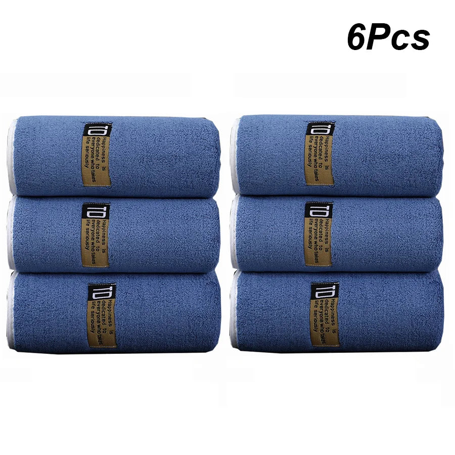 Six thickened microfiber cleaning towels in blue and gray packaging.