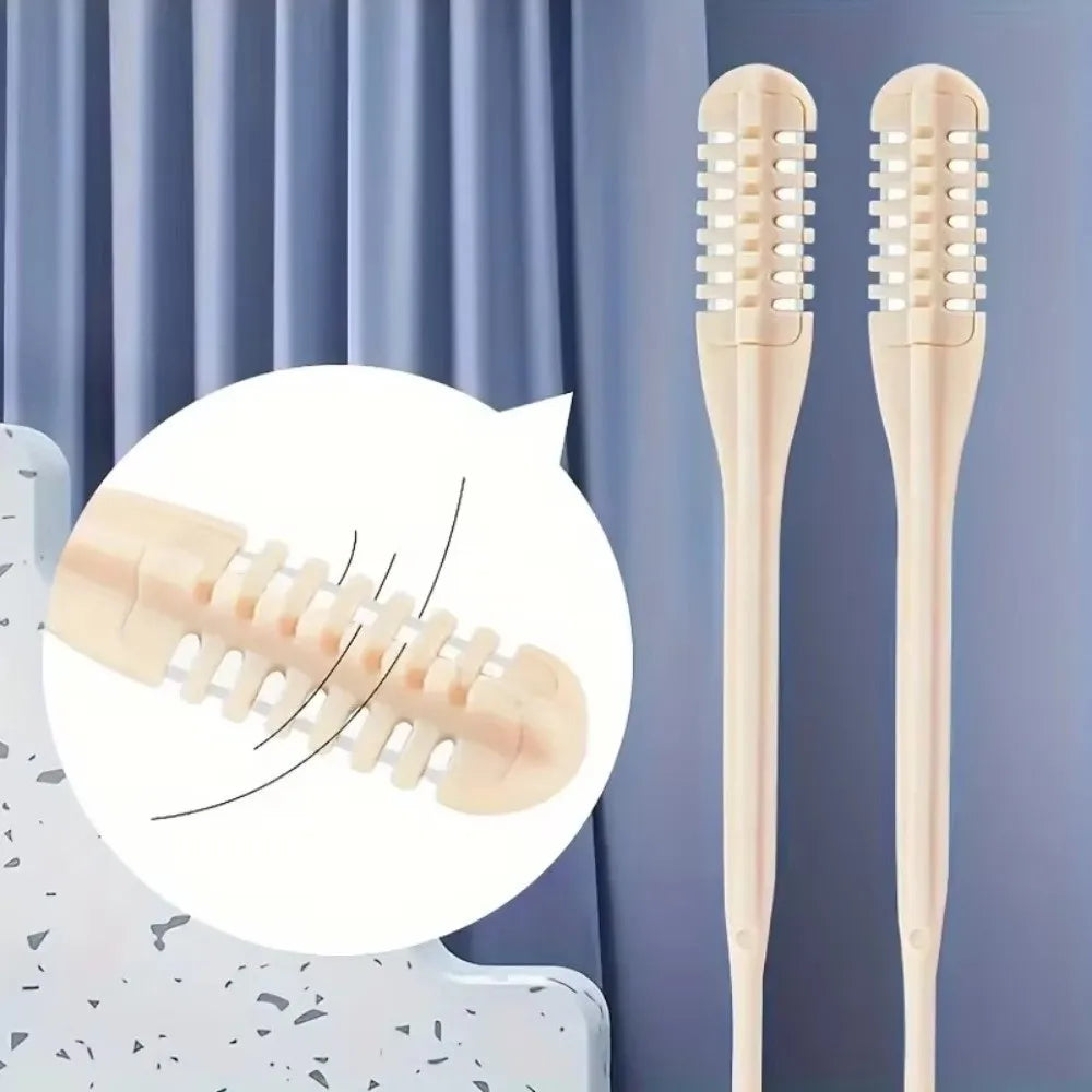 A set of light pink 360° rotating nose and ear hair trimmers displayed against a blue curtain backdrop.