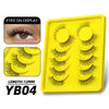 Yellow false eyelashes in a tray with an eye display showing the lash length.