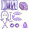 A purple heatless curling kit featuring silk accessories including a pillow, a hair tool, and various purple rollers.