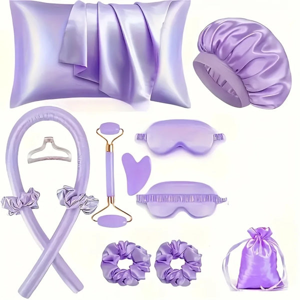 A purple heatless curling kit featuring silk accessories including a pillow, a hair tool, and various purple rollers.