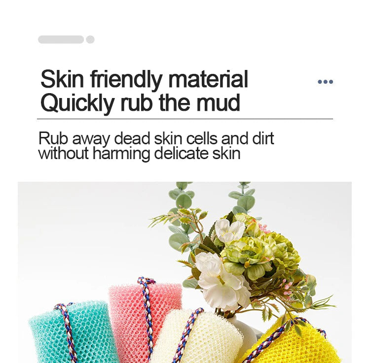 A close-up of a pink and yellow exfoliating sponge with green foliage and white flowers.