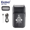 A black Kemei KM-T366 electric beard shaver and trimmer with a mesh head and charging cable.