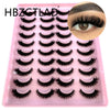 Plateau en plastique rose contenant un kit de faux cils de renard naturels.