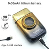 A gold and black Kemei KM-T228 lithium battery and charger with a Type-C USB interface.