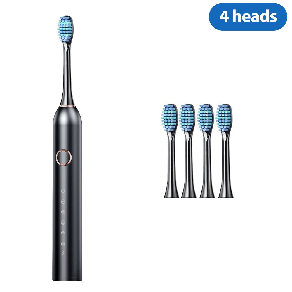 A black professional sonic electric toothbrush with four brush heads shown next to the main body.