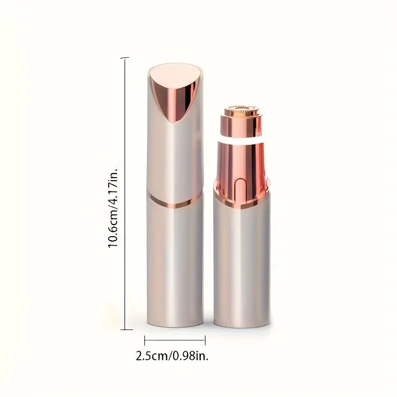 A silver-toned rechargeable facial and eyebrow shaver with a metallic pink cap shown next to its measuring scale.