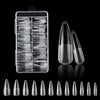 A collection of frosted French false nails in various natural finishes displayed in a clear plastic case and loose.