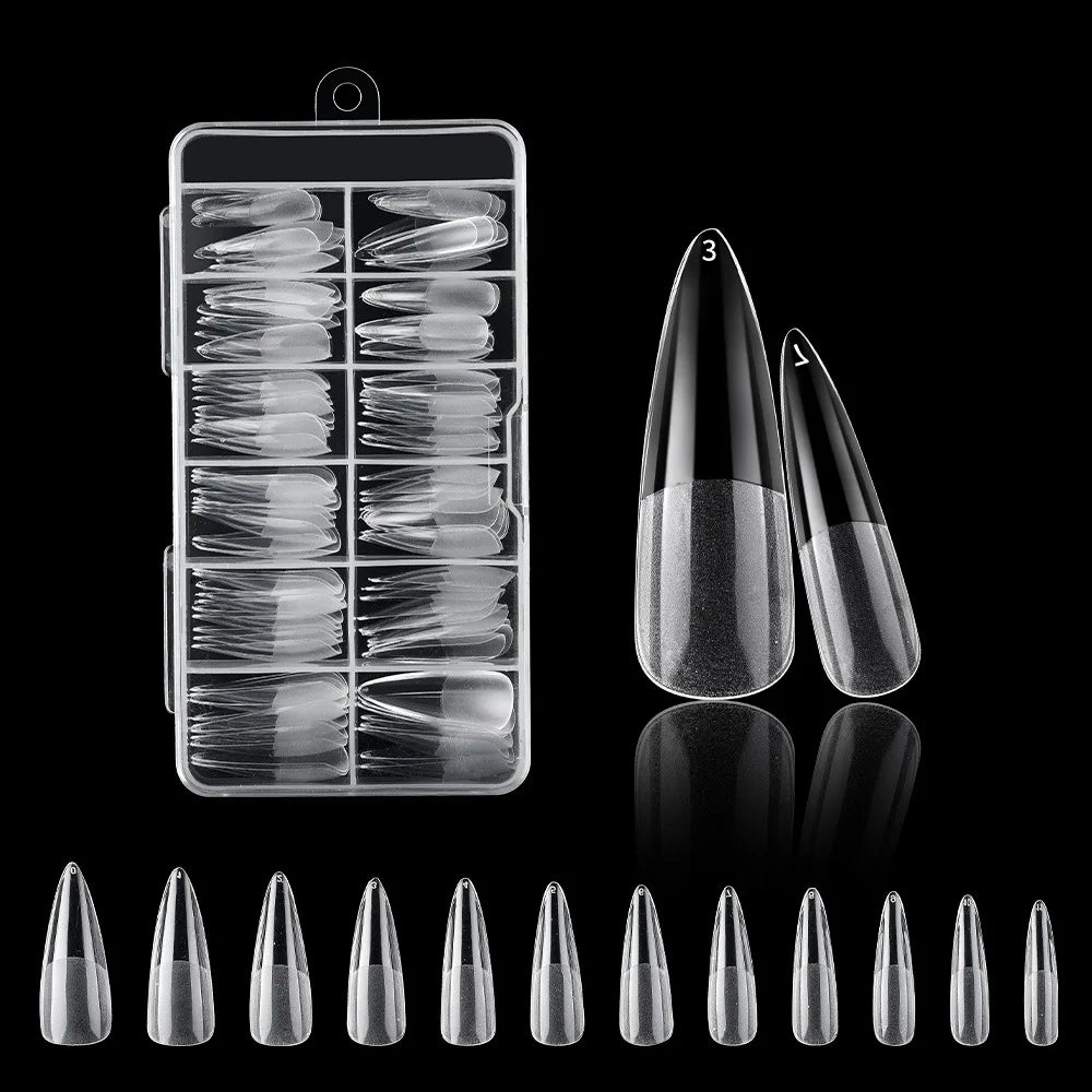 A collection of frosted French false nails in various natural finishes displayed in a clear plastic case and loose.