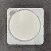 A white circular makeup mirror with a luminous effect is shown in its packaging.
