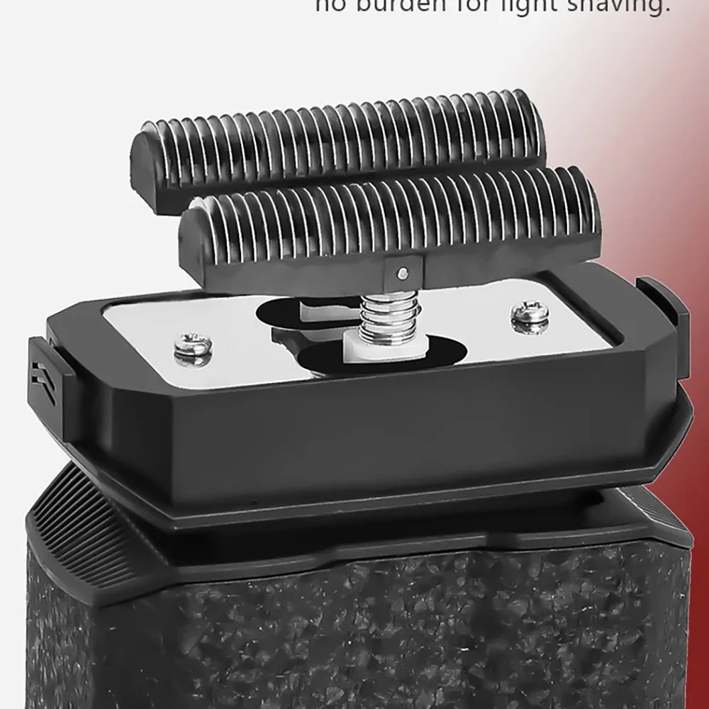 A black cordless electric foil shaver with a textured head resting on a dark gray base.