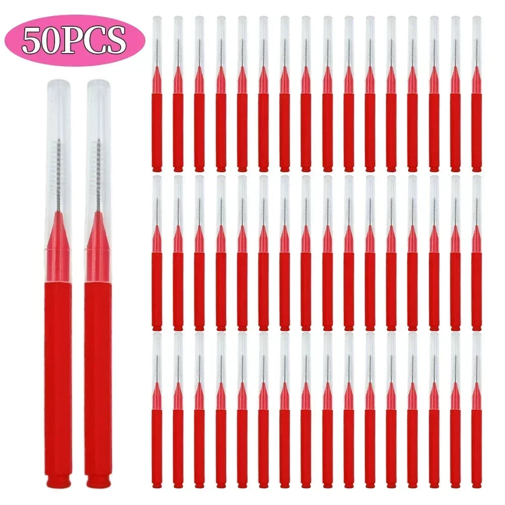 A set of 50 mini brow and eyelash combs in red and clear plastic.