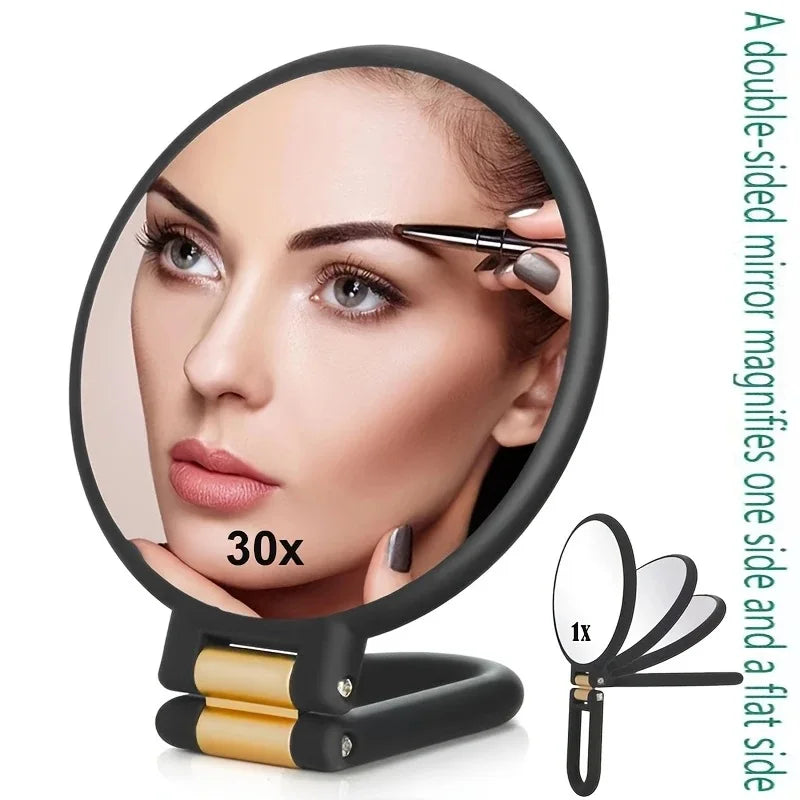 A double-sided mirror magnifies one side and a flat side for close viewing.