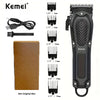 A black professional electric hair clipper trimmer with various attachments and an original box.