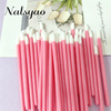 A set of 50 pink and white disposable lip applicator brushes arranged in a vertical line.